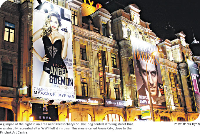 A glimpse of the night in an area near Khreshchatyk St. The long central strolling street that was steadily recreated after WWII left it in ruins. This area is called Arena City, close to the Pinchuk Art Centre.